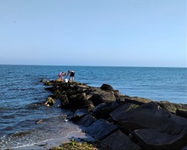 Crabbing on the Rock Jetty at Charlestown Breachway State Beach, RI